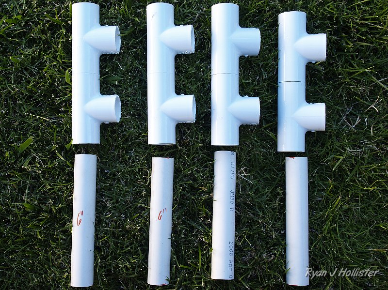 _6219800.JPG - Next, insert the 6" lengths of pipe into the bottom of the "T" assemblies as shown.