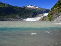 Easy to see the influence of the waterfall's effect on the lake.  The falls don't pick up much sediment and thus displace some of the lake's suspended load of glacial flour.