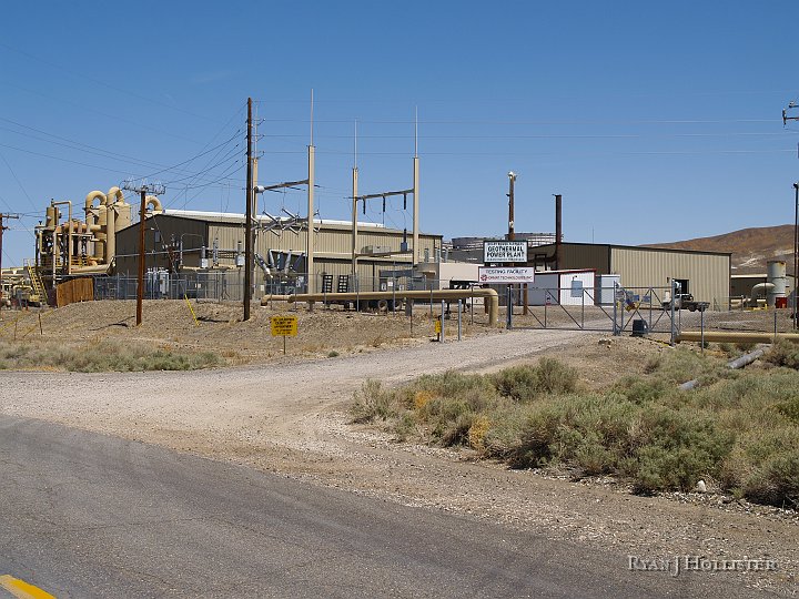 _5098983.JPG - The hot spring mountains have been tapped for their geothermal potential.  The field trip guide stated that these plants produce something in the neighborhood of 15 megawatts of electricity each year!