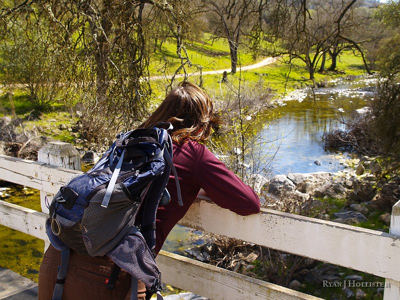 _3217223.JPG - Laura enjoys the view of Mraiposa Creek from the bridge