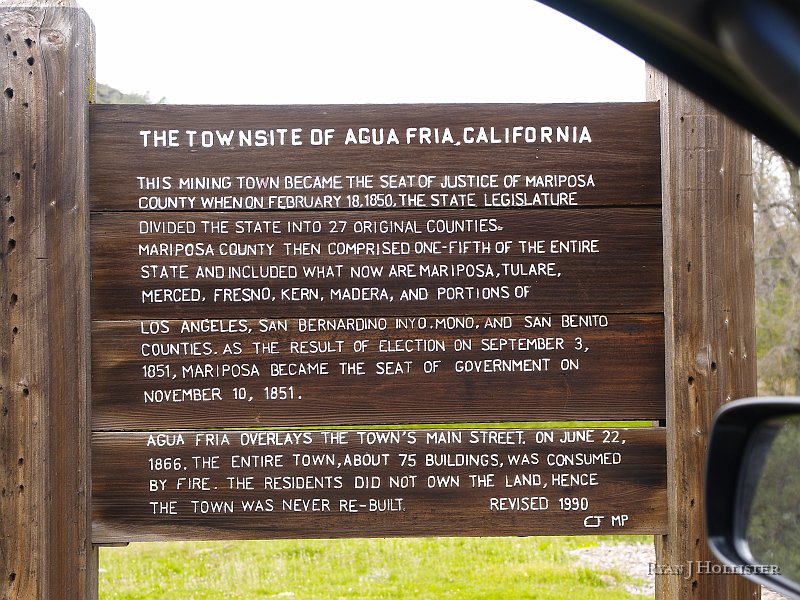_3217224.JPG - On our way towards the Pine Tree mine, we took a shortcut along Agua Fria road which ran us by this old sign describing the town that once existed here.