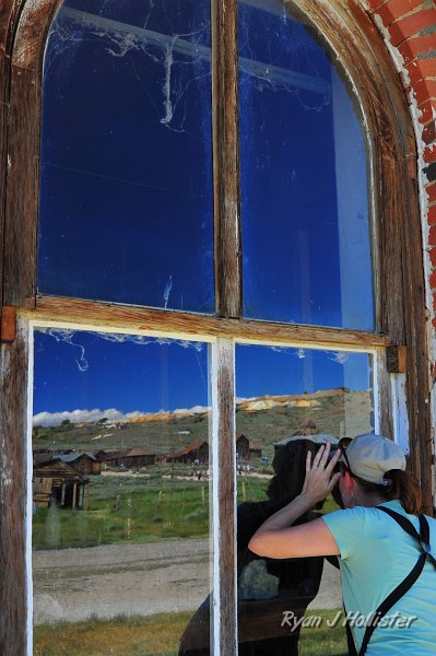 RJH_4301.JPG - Laura looks through a window.