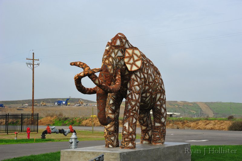 RJH_7386.JPG - Welcome to the Fossil Discovery Center of Madera County, located in the lovely metropolis of Fairmead, CA.  A nice life-size Columbian Mammoth graces the front of the new building.  Note the landfill in the background - it was the site of the fossil discoveries.