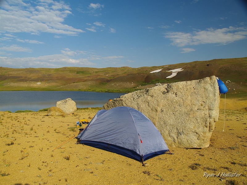 20090810_high_emigrant_lake_0252.JPG - Hard to believe but true:  The sun came out blazing a mere 20 minutes after the rain showers.   Note our Katydyn Basecamp Gravity water filter hanging from the boulder.  Gravity's the only way to go.