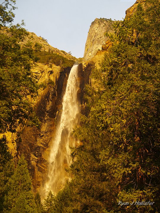 _7010086.JPG - The smoke in the atmosphere cast an amazing orange hue across the valley.  This is the actual coloration of Bridalveil Falls.