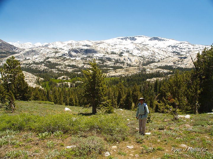 _6199723.JPG - My dad surveys where we'd started and where we had yet ot go.  The flat, bright green area is Lower Relief Valley.