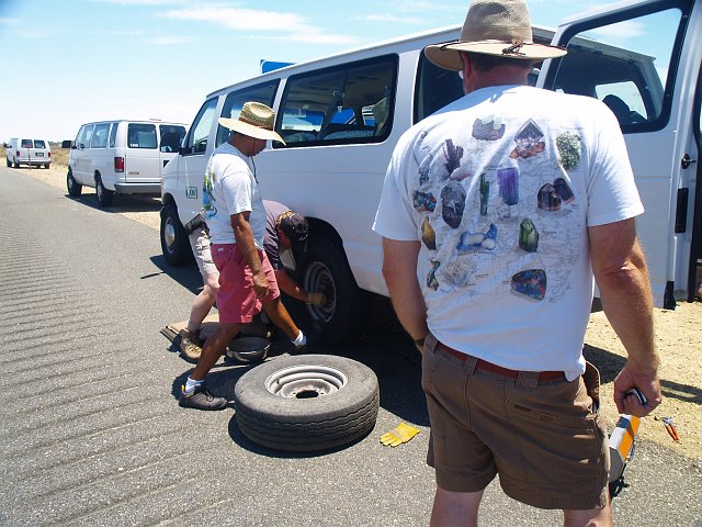 _6152484.JPG - What a way to start the trip… a blown tire near Boron, CA.  Changing a tire in 115 degree heat is groovy.