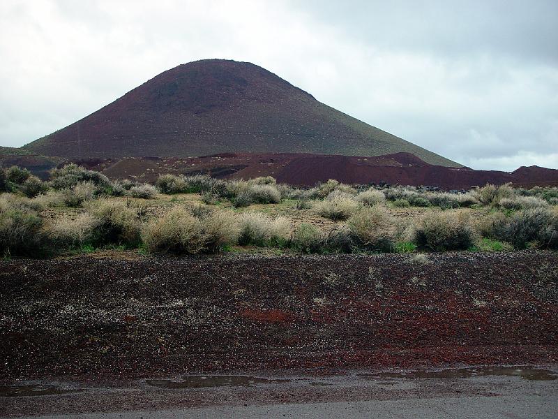 015.jpg - Coso cindercone.  This is a fairly young volcanic feature, and is currently being mind for its scoria cinders... you may know them as landscaping lava rocks.