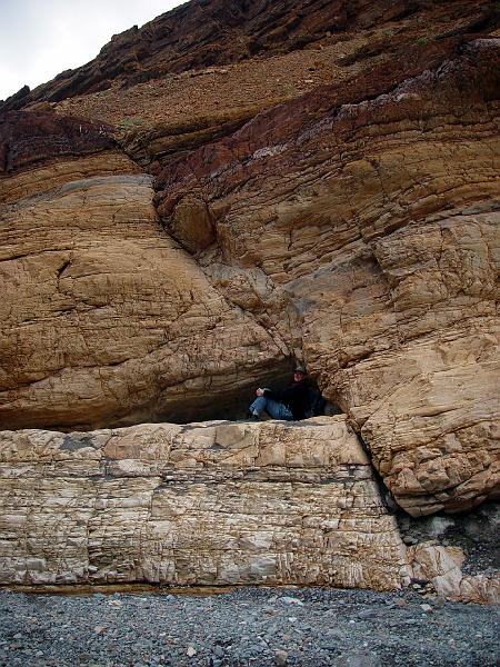 049.jpg - Laura demonstrates the headwall (R) and footwall (L) concepts of faults.