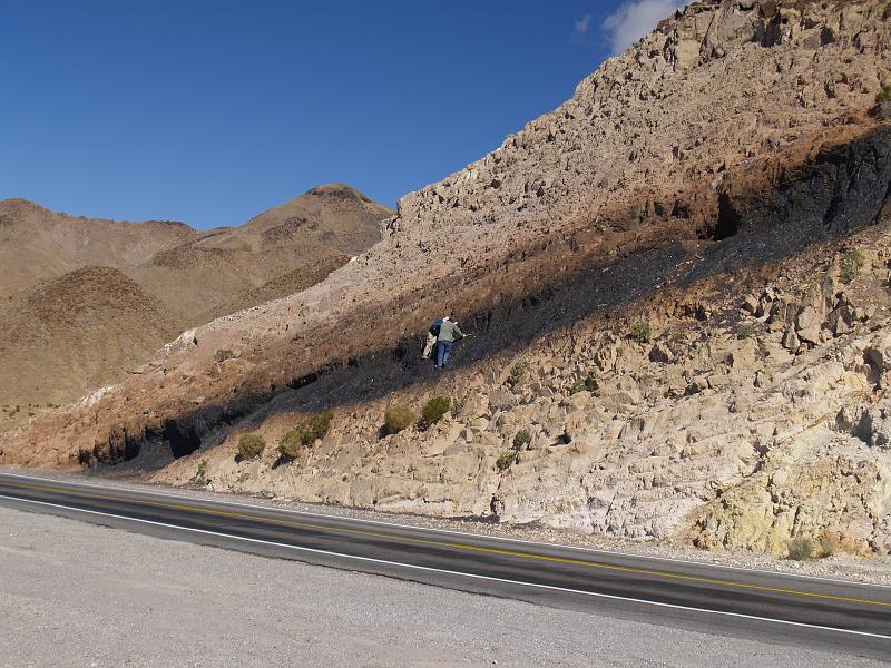 _2180756.JPG - What is that black stuff?  It confused geologists for a while, but it's welded ash fall (tuff) which turned into glass.