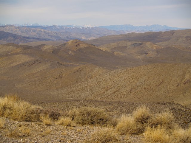 _2180830.JPG - The high peaks in the background are the Sierra Nevada's.  The low rolling hills in the foreground is what all of Death Valley looked like before the valley started splitting apart.