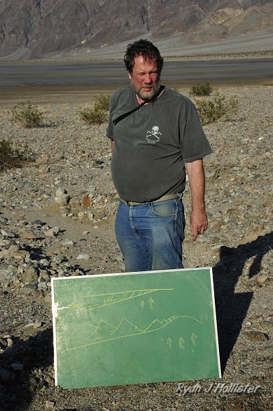 _DSC0143.JPG - Garry gives us the significance of the Mormon Point Turtleback.  It used to reside under what are now the Panamint Mountains.  Those mountains slid of several million years ago to the west allowing the Black Mountains to pop-up as the immense pressures were released.