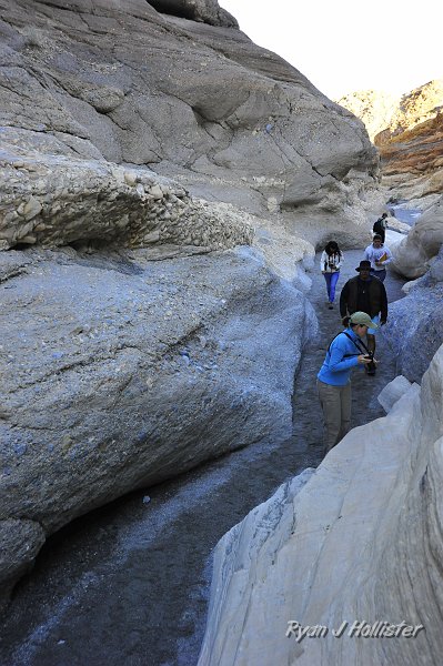 _DSC0350.JPG - Everyone checks out the sweet slot canyon features of Mosaic Canyon.
