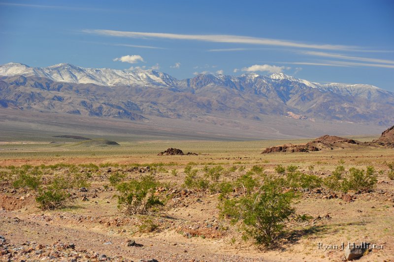 RJH_7914.JPG - This spot would have been in deep seas near the equator 700 million years ago, and the mountains in the background would have not existed.  The rocks in the foreground would have been attached to pieces of what is now Antarctica and Australia when the supercontinent called Rodinia existed.