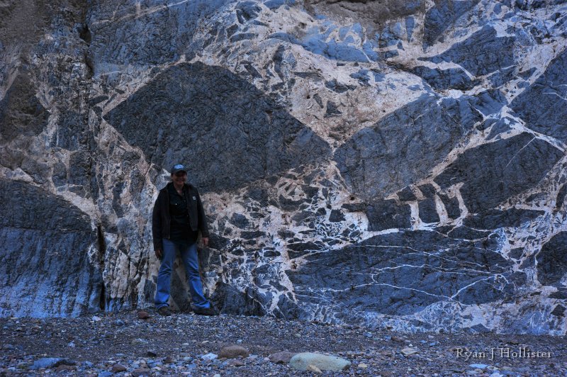 RJH_8174.JPG - Laurel demonstrates the scale of the instrusive megabreccia.