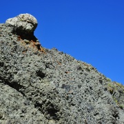 A close-up of the granitic boulder that is included in the flow.
