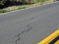 The mighty San Andreas does its work on recently repaved asphalt.