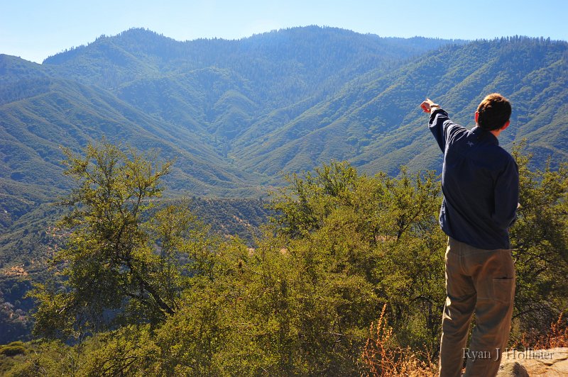 RJH_5911.JPG - Greg Stock points out the more ancient landscape that had creek channels flowing perpendicular to the Sierran uplift.  Since their channels didn't steepen all that much, the creeks didn't downcut as rapidly, thus leaving more ancient terrain.