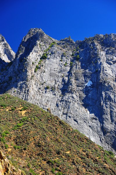 RJH_5918.JPG - The white scar in the center-right of the photo is a fresh rock-fall that has exposed the true color of the marble.