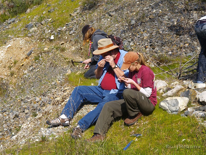 _3147136.JPG - Garry looks through some of the old tailings for gold specs.  None were found this day.