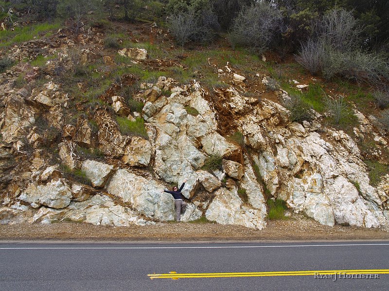 _3147159.JPG - Mrs H show us some of the jumbled, hydrothermally emplaced Mariposite & quartz.   This block literally seperates the Foothill Terraine & Calaveras Complex.  What does that mean?  This area was four or five miles underground in a subduction zone many moons ago.