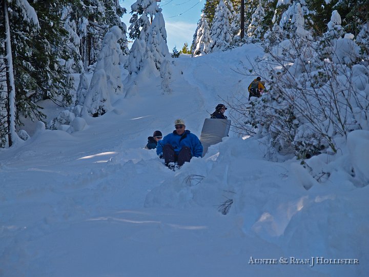 _C276003.JPG - After a half-hour of labor, the chute was ready for prelim runs.  My dad gets to the, ahem, bottom of the hill.