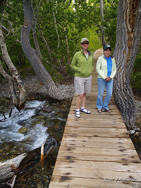 _6049352.JPG - A tired Laura and my mom enjoy the peace near the creek.