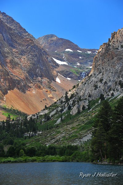 RJH_4750.JPG - Looking Parker Canyon.  Metamorphic rocks on the left, instrusive granitic rocks (quartz monzonite) on the right with a pretty waterfall in the back.  The granitic rock is over 150 million years younger than the metamorphic rock.