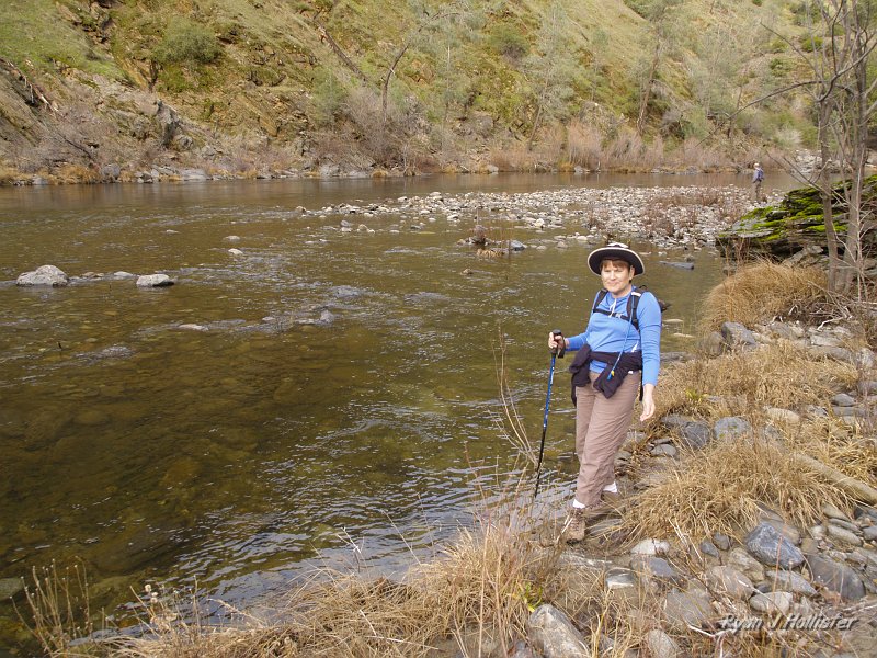 indian_creek_011610_1266.JPG - After dropping nearly 2000', my mom had to touch the icy waters.