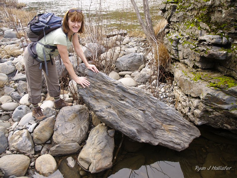 indian_creek_011610_1269.JPG - Laura and nice metamorphic rocks along the river.