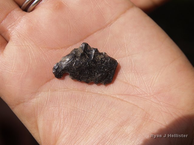 _7124164.JPG - At long last Dave finally found the remnants of an actual arrowhead.  Notice the notch on the bottom-left of the head.