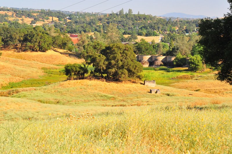 RJH_4150.JPG - The concrete buttresses are the old dam that held the tailings.
