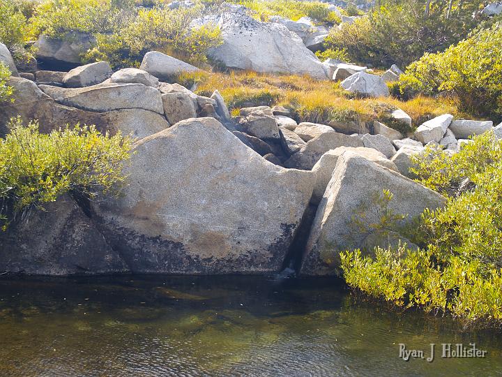 20090919_kuna_lake_0438.JPG - This boulder (about five feet tall & 20' wide) had the entirety of the creek coursing between its crack.  We wished our back yard fence could look like this.