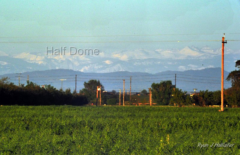 RJH_1513.JPG - To start the trip, here's a view of Half Dome from Verduga Road in Turlock, a whoping 78 miles away as the crow flies.  Half Dome is directly beneath the space between the "f" and "D", just above the dark mountains in the foreground.