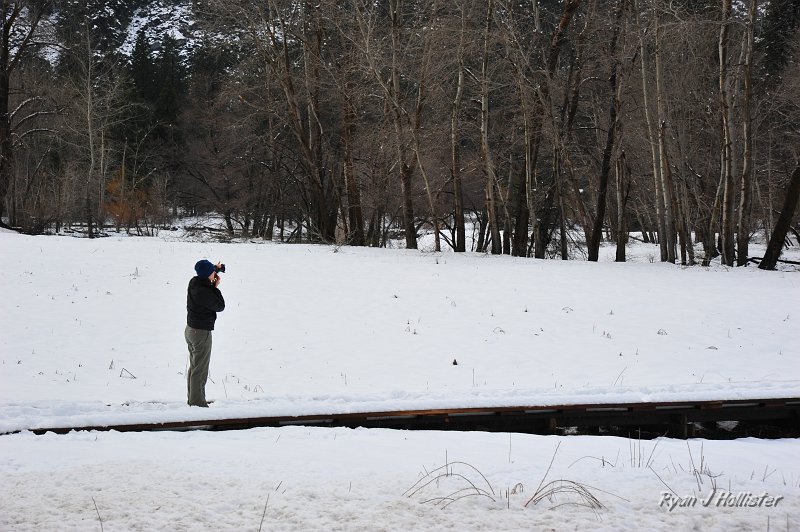 RJH_1512.JPG - Laura gets a shot of Yosemite Falls from the snowy boardwalk.