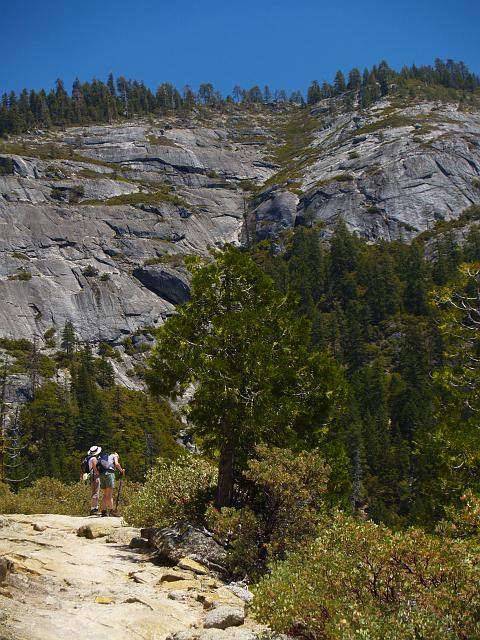_6012387.JPG - My mom & Laura ponder the trail ahead while soaking in the views of Wawona Dome.
