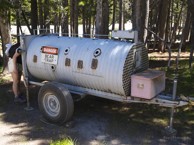 _8094630.JPG - This bear trap was next to the "A" loop of campsites along the river.  Mandy nearly lost her head to the huge imaginary bear.