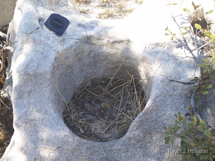 _9235195.JPG - So here was one of the biggest conundrums I've run across in my hiking.  This hole sure looks like it was ground out by rocks in an eddying stream.  But.... (see next picture)