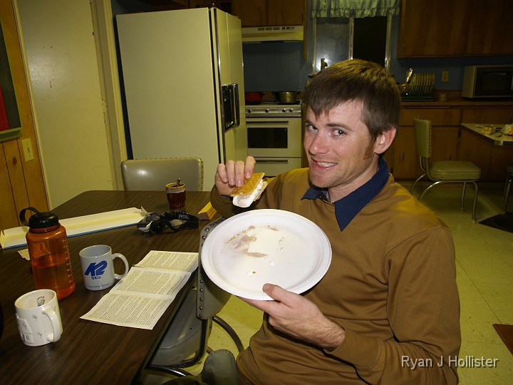 _B085524.JPG - I got jipped out of a chocolate bar, so Nav was kind enough to make me smore with Hot Chocolate Powder.  Mmmmm!