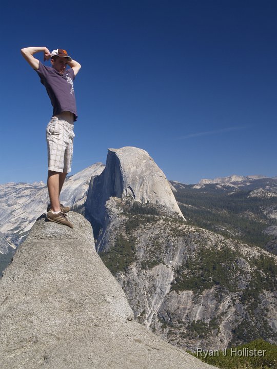 _9215013.JPG - Trevor at Glacier Point.  Maybe next year he'll have something to flex!