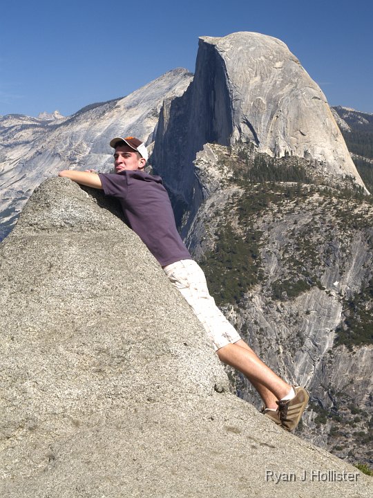 _9215025.JPG - Trevor feigns a long fall. Don't worry, it's only a couple thousand feet down.