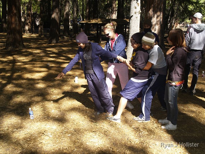 _9225062.JPG - Time for a team building exercise.  Just how can we rescue the water bottles from teh ocean of molten Velveeta cheese while standing on an island of Nachos?