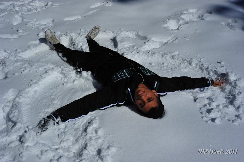 _RJH9872.JPG - Omar touches snow for the first time.