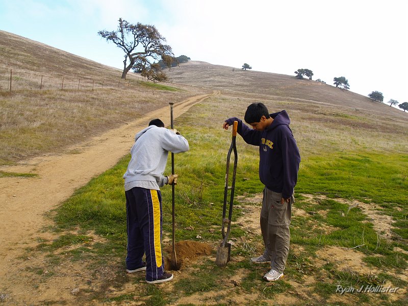 pacheco_120509_1036.JPG - While the trial crew worked the trails, Miles, Diego & Selva went to install new metal trail signs to replace the wooded ones that were getting broken by the cattle.