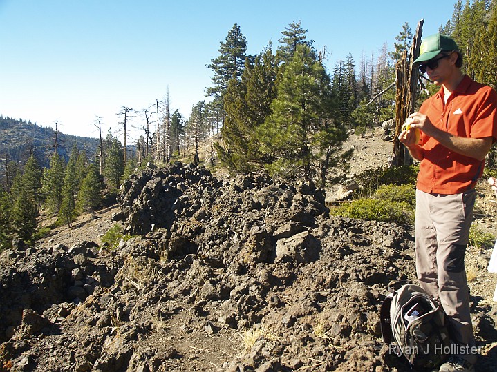 _B155631.JPG - Steve eats as I drooled over the nice volcanic breccia from an old lahar (mudflow).