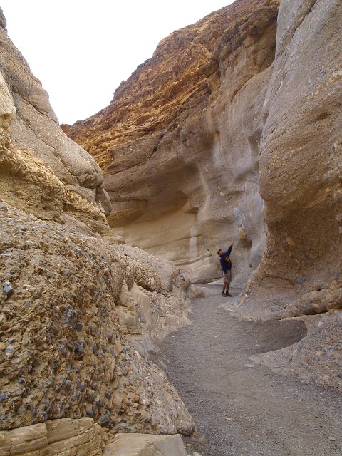 _2180803.JPG - That's me pointing out how high the water has been during flash floods.
