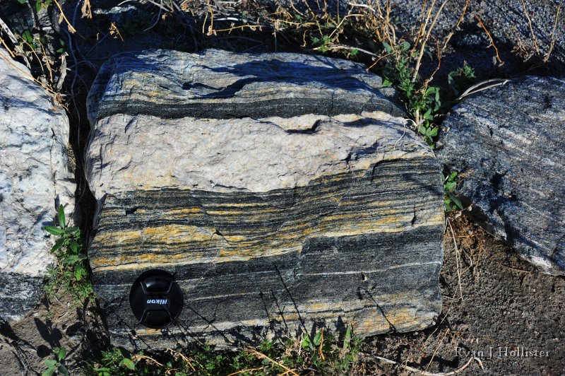 RJH_7950.JPG - A nice piece of gneiss schist that dates to 1.7 byo. There's also a nice normal fault cutting across the rock.