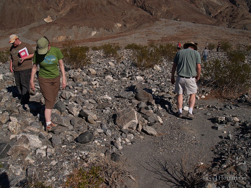 P2175448.JPG - Professor Garry Hayes (right) and my wife look for representaive rock samples to help piece the story together.