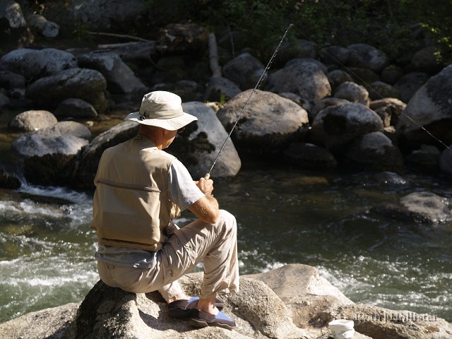 _7274481.JPG - As my mom said, this is the only time you'll ever see my dad sitting still.  I like his weet water socks.  And that concludes this trip!