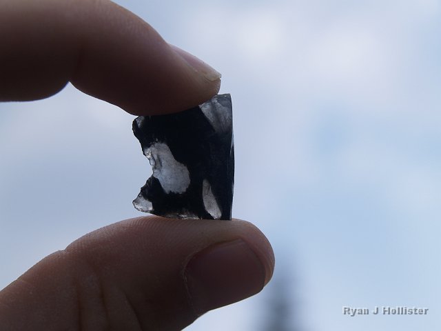_7124145.JPG - After several minutes of searching, I found this neat butt-end of a knife point.  I assume the notch on the back was for fitting the point into a handle.